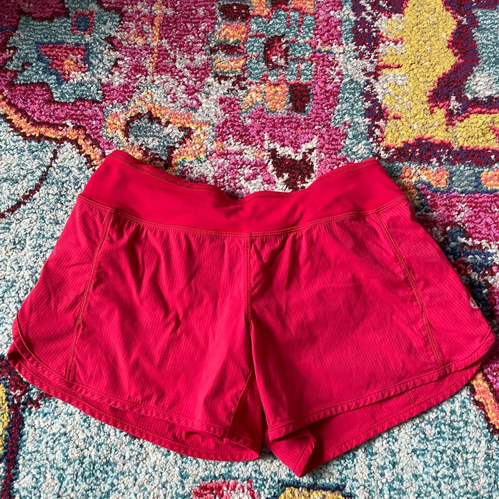 UNWORN RED CARNATION SPEED UPS LULULEMON SIZE 4